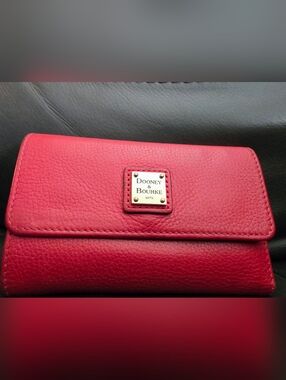 Dooney & Bourke Pink-Red Pebble Leather Wallet with Gold Plaque